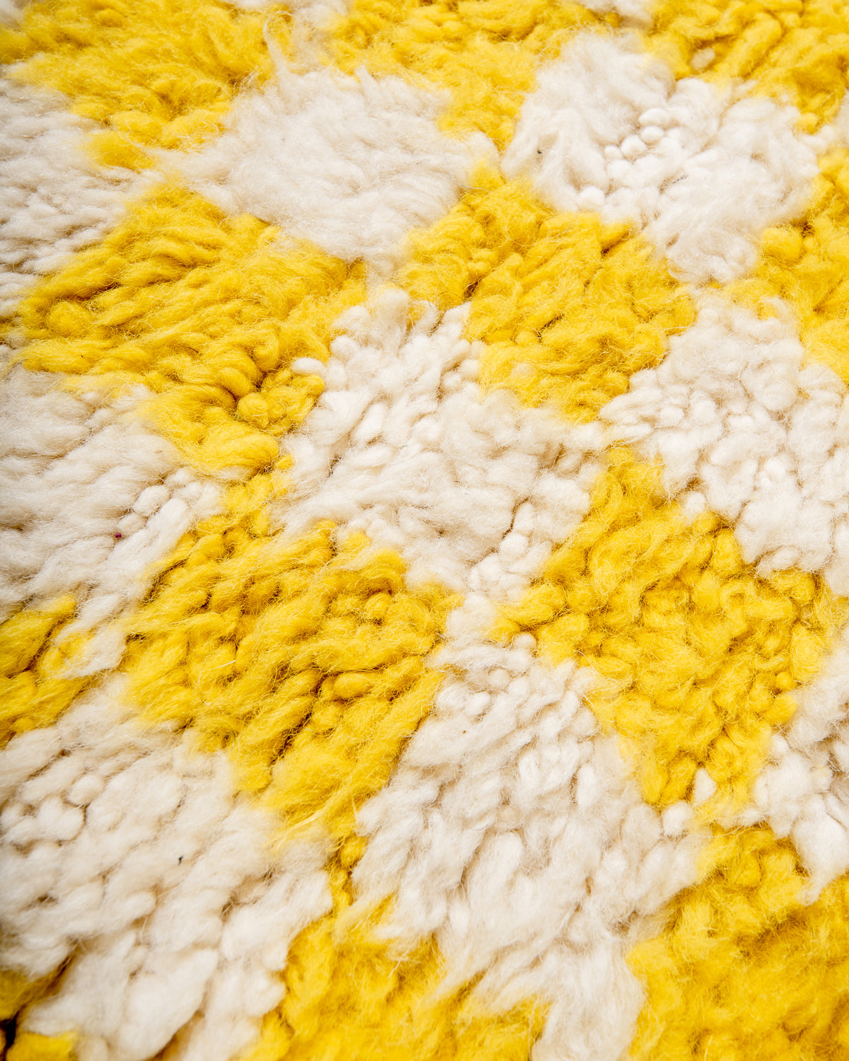 Modern, designer, handcrafted Berber rug from Morocco. Beniourain carpet with beautiful colours and patterns and fluffy wool texture.